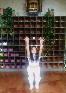 Practitioner performing cupping therapy to support circulation and muscle relief.